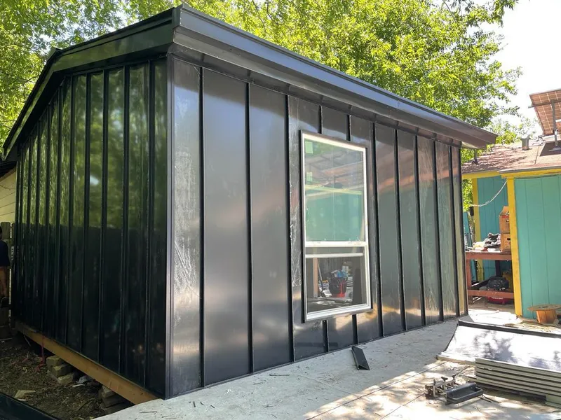 Black standing seam metal wall panels for Roof Inspection in Monson